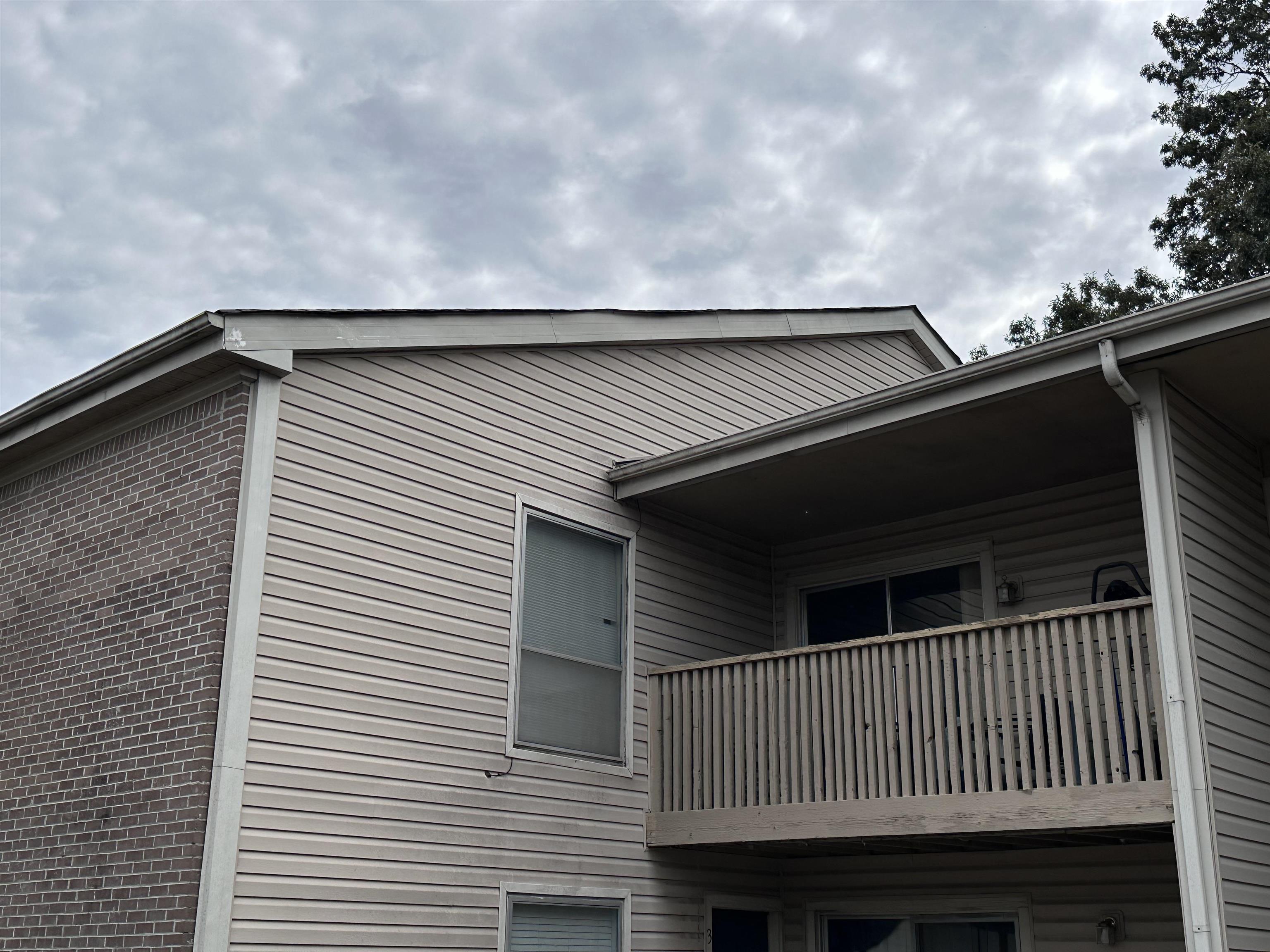 a view of a house with a balcony