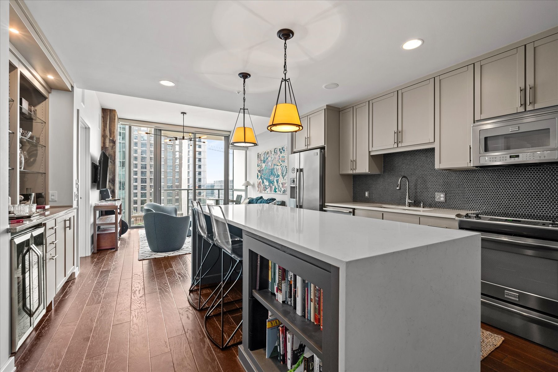 a kitchen with a table chairs stove and cabinets