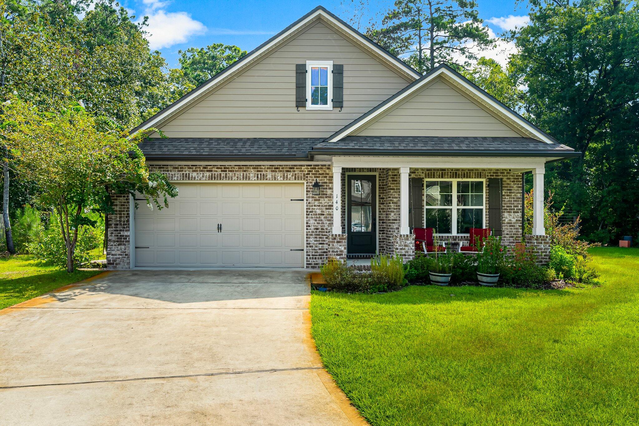 a view of a house with garden