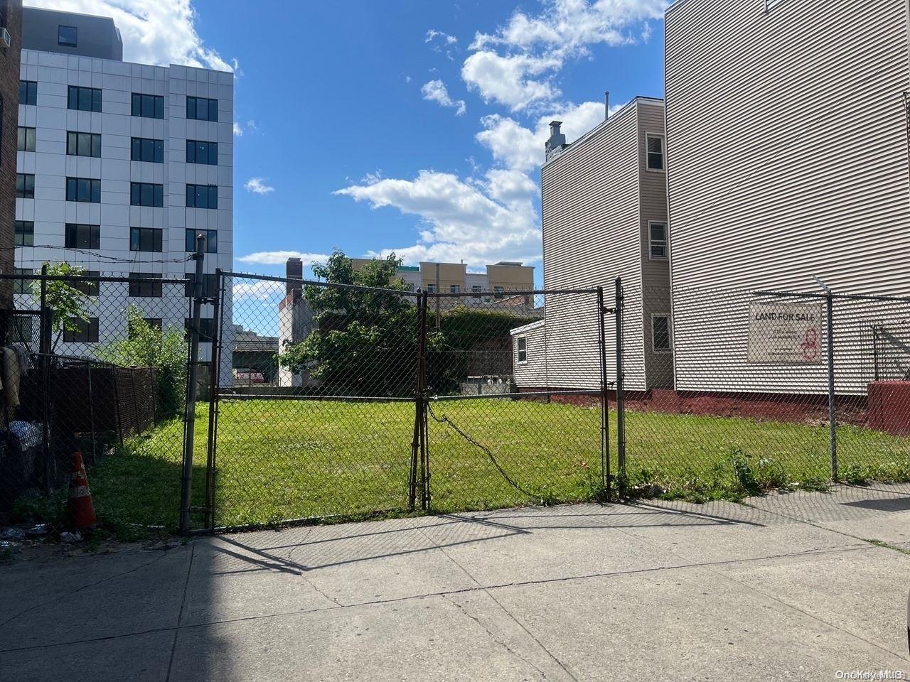 a view of a building with a yard