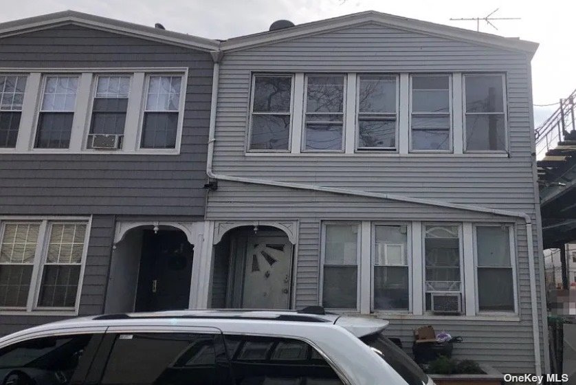 a view of a house with a balcony