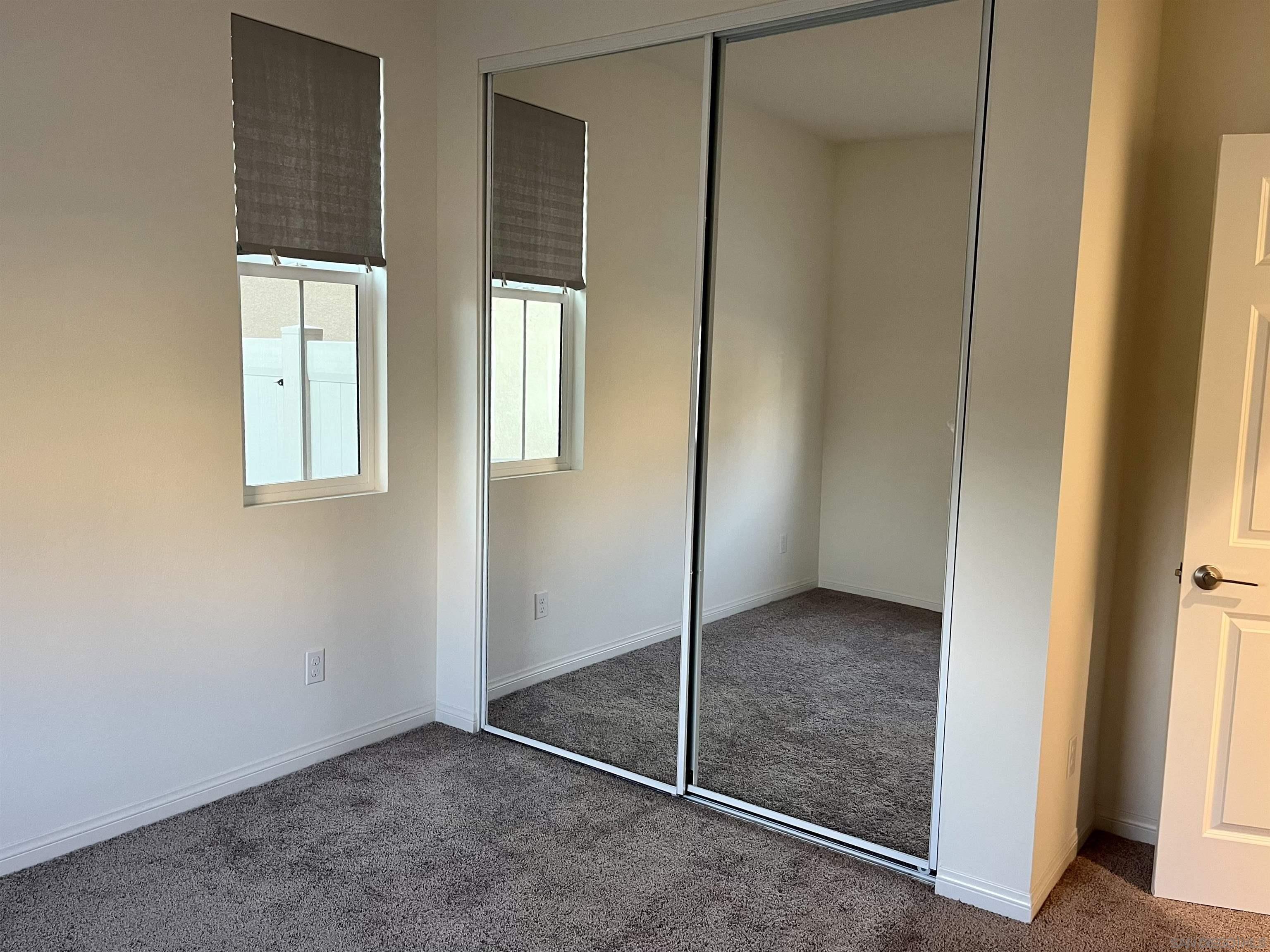 a view of an empty room with window