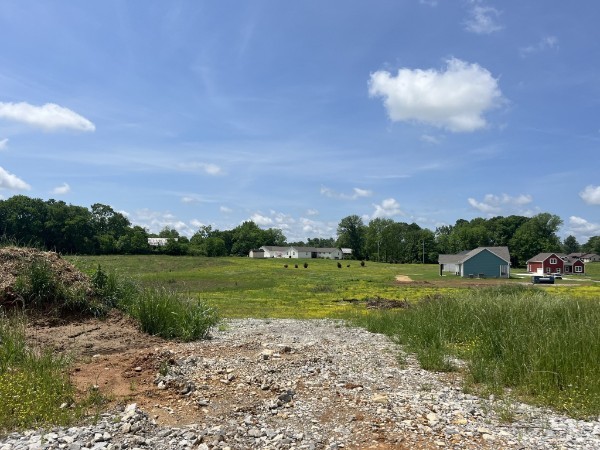 a view of a lake with a big yard