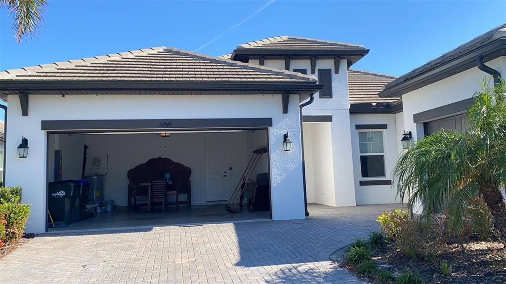 a view of house with outdoor space