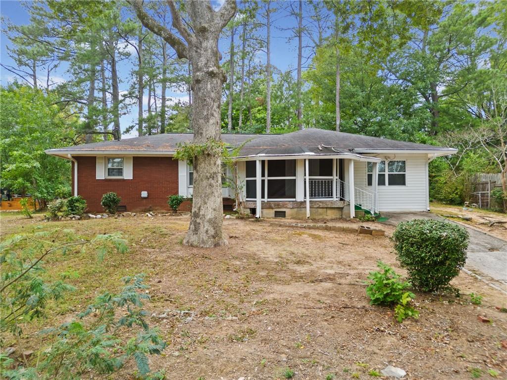 front view of a house with a yard