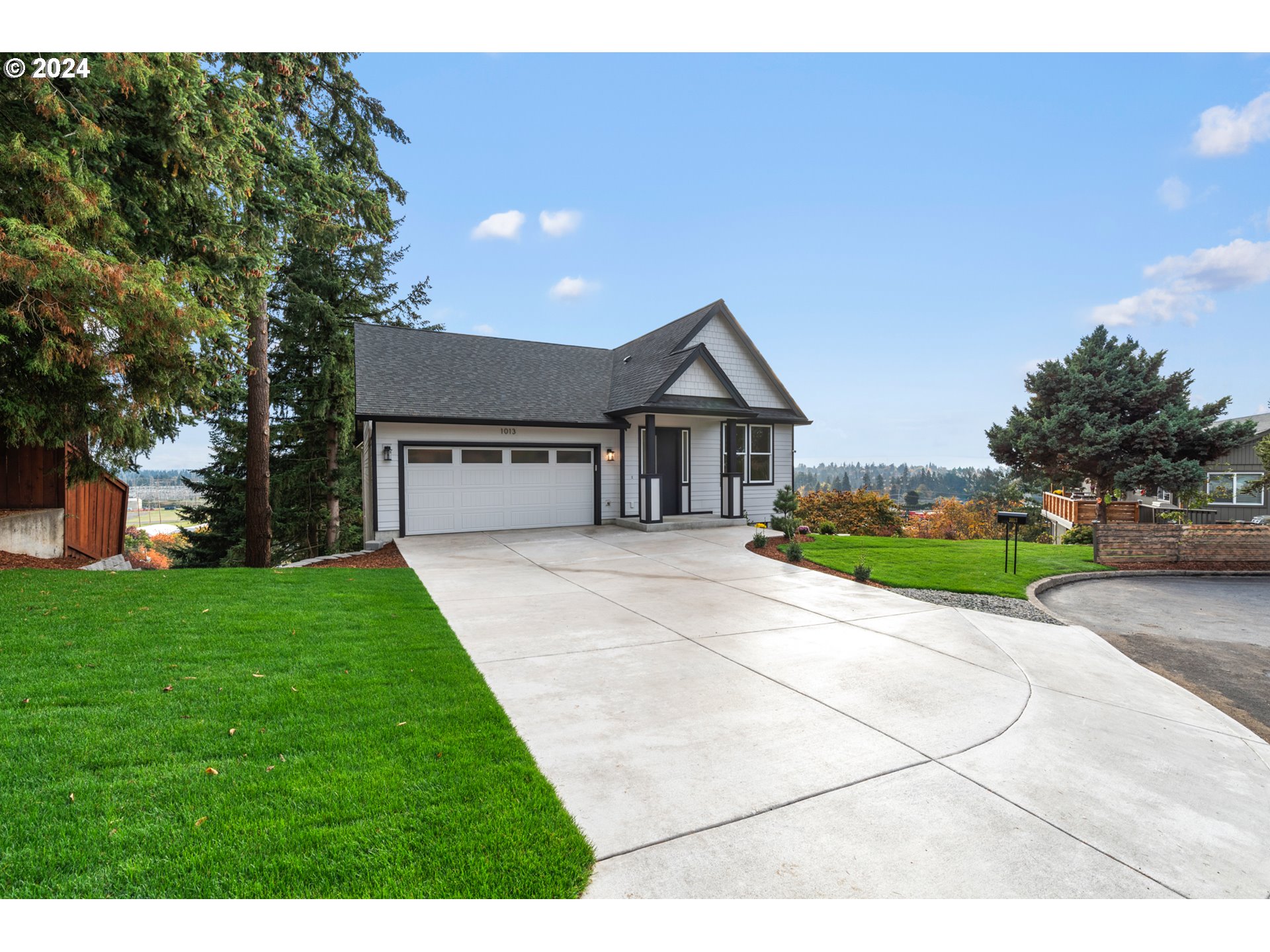 a house view with a garden space