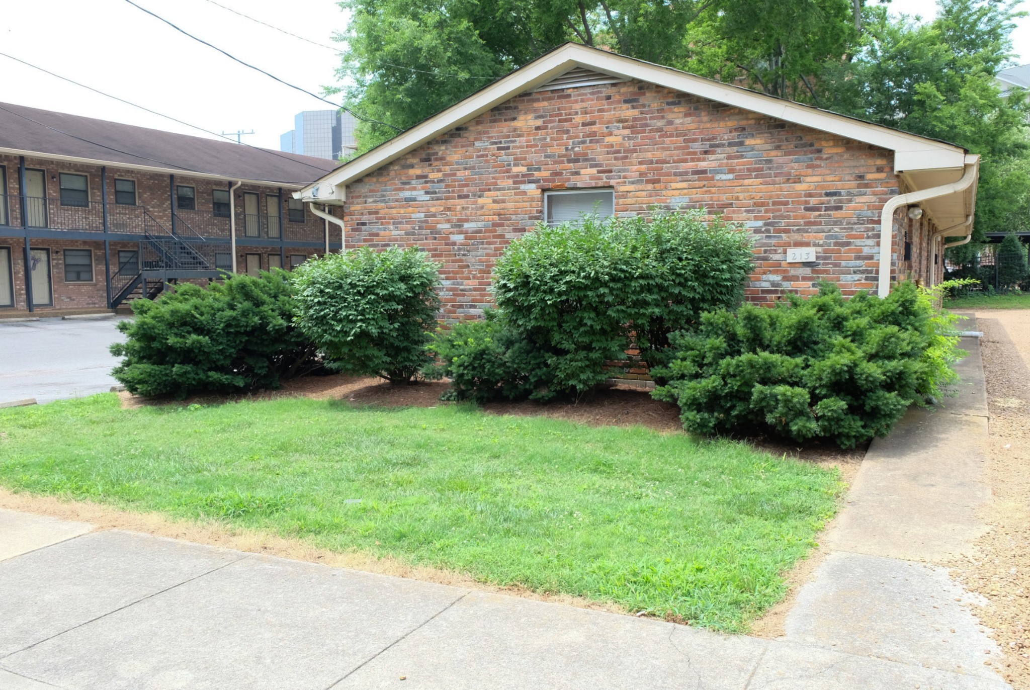 a backyard of a house with lots of green space