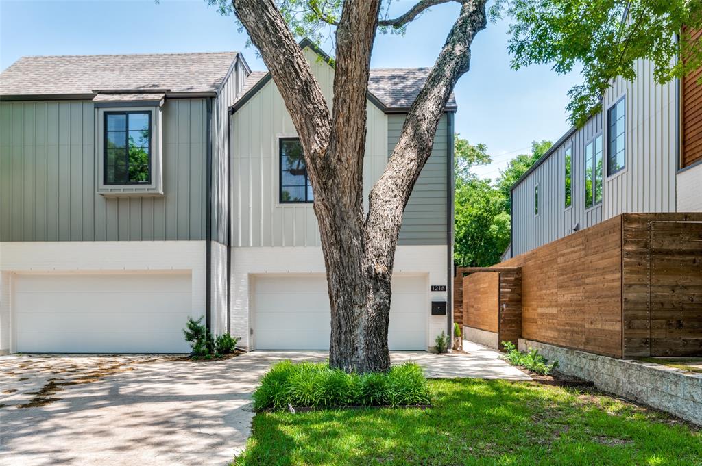 a view of a trees in front of a house