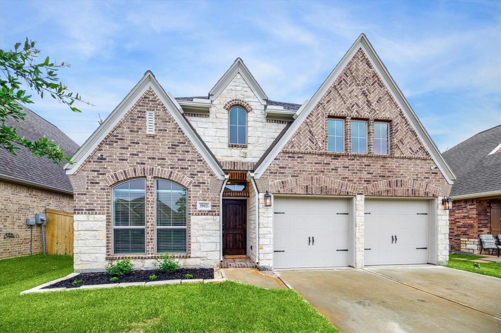 Stunning curb appeal on this like new Perry home.