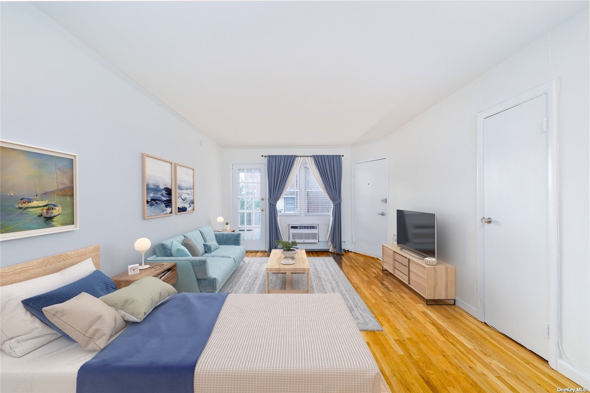 a living room with furniture and a flat screen tv