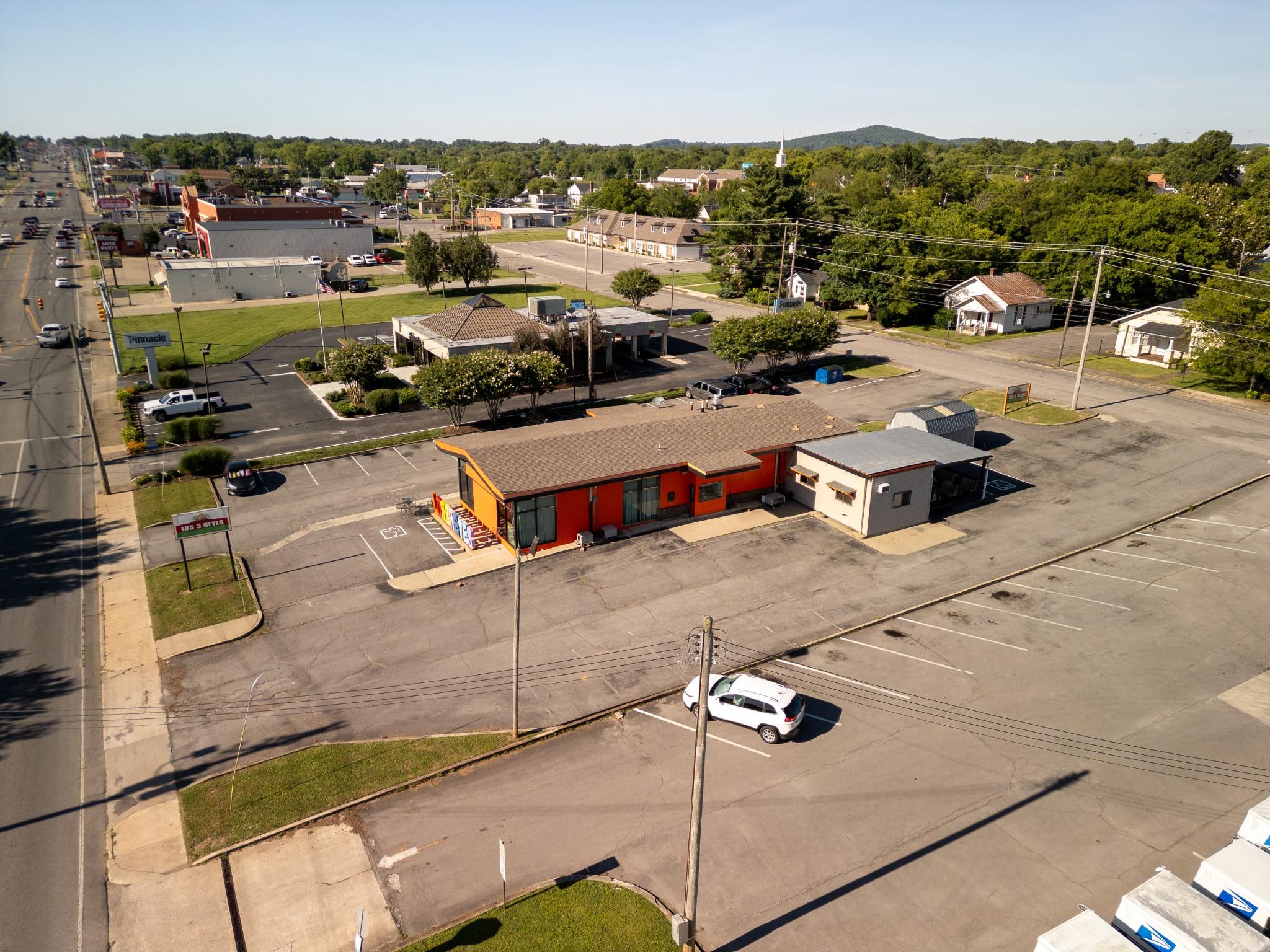 an aerial view of a parking