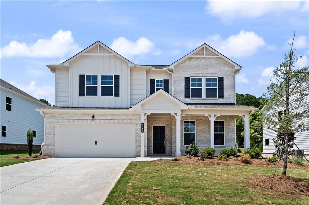 a front view of a house with yard