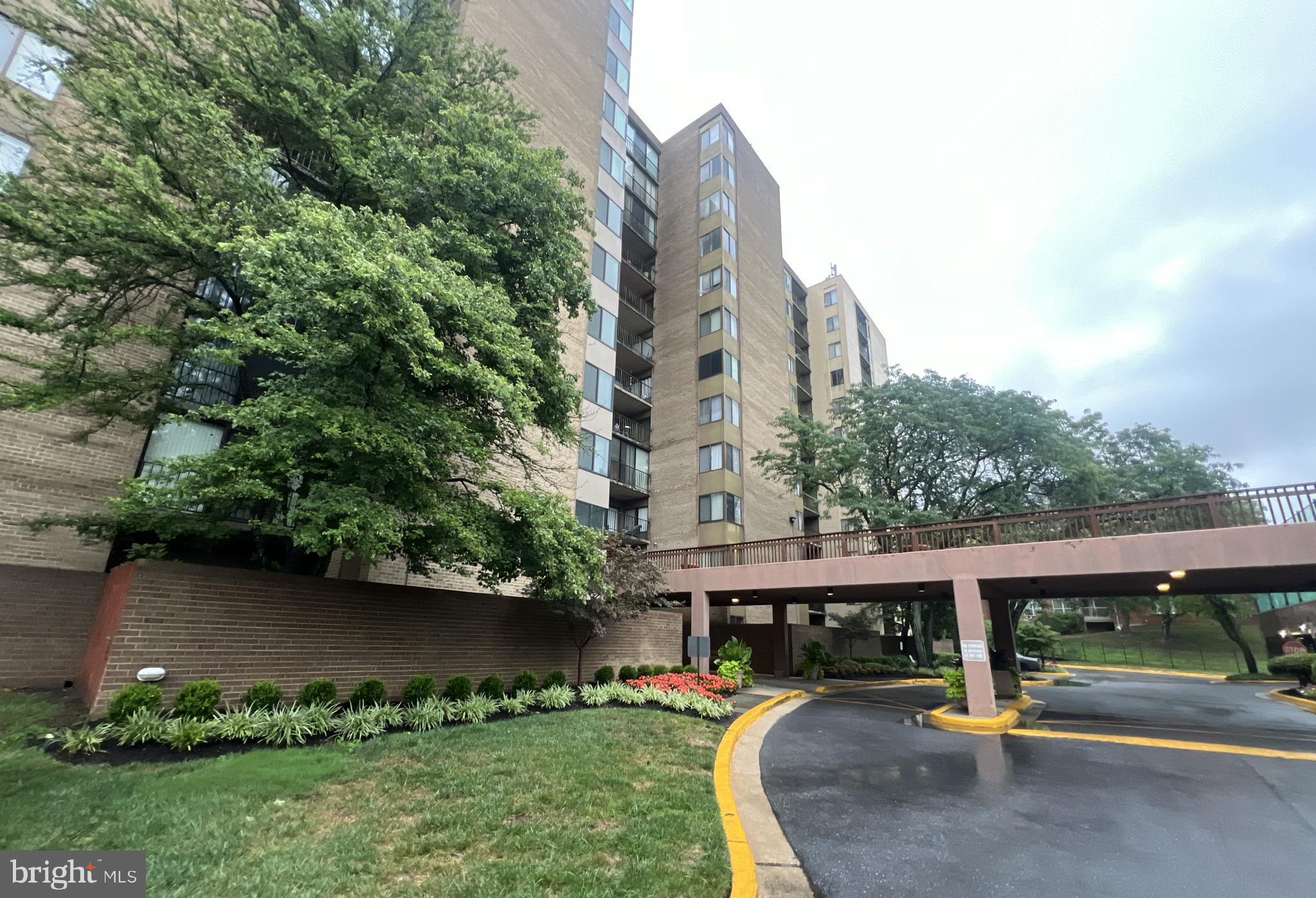 an outdoor view of building with green space