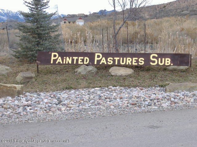 a view of a street with a sign board