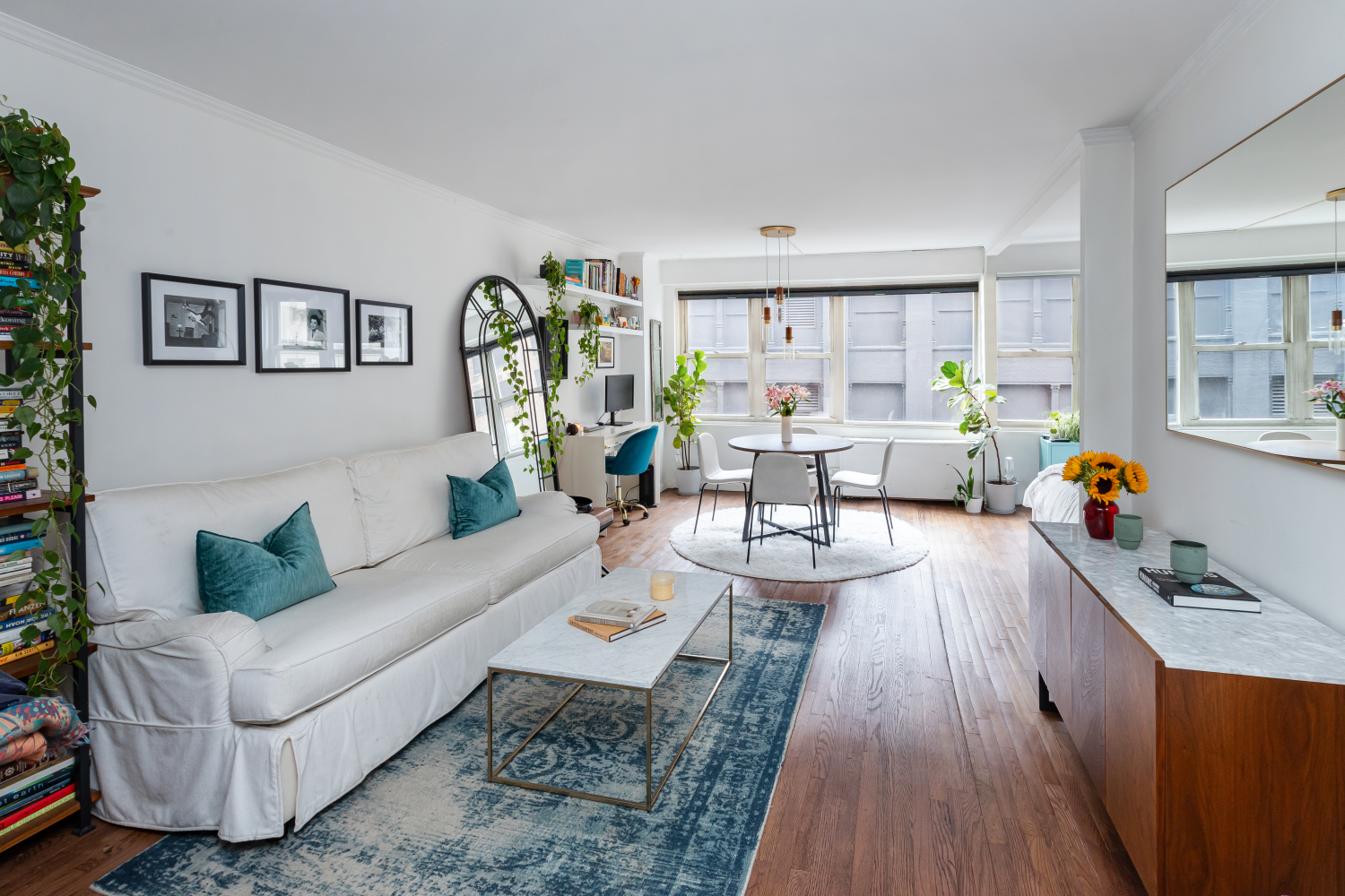 a living room with furniture and a table