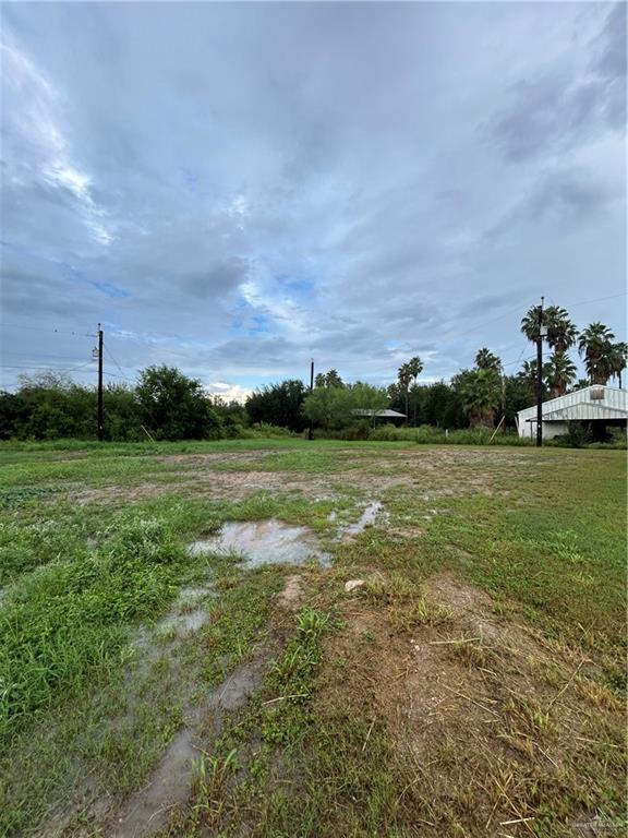 a view of a lake with a big yard