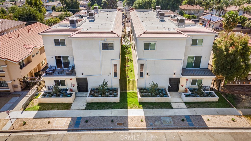 an aerial view of multiple house