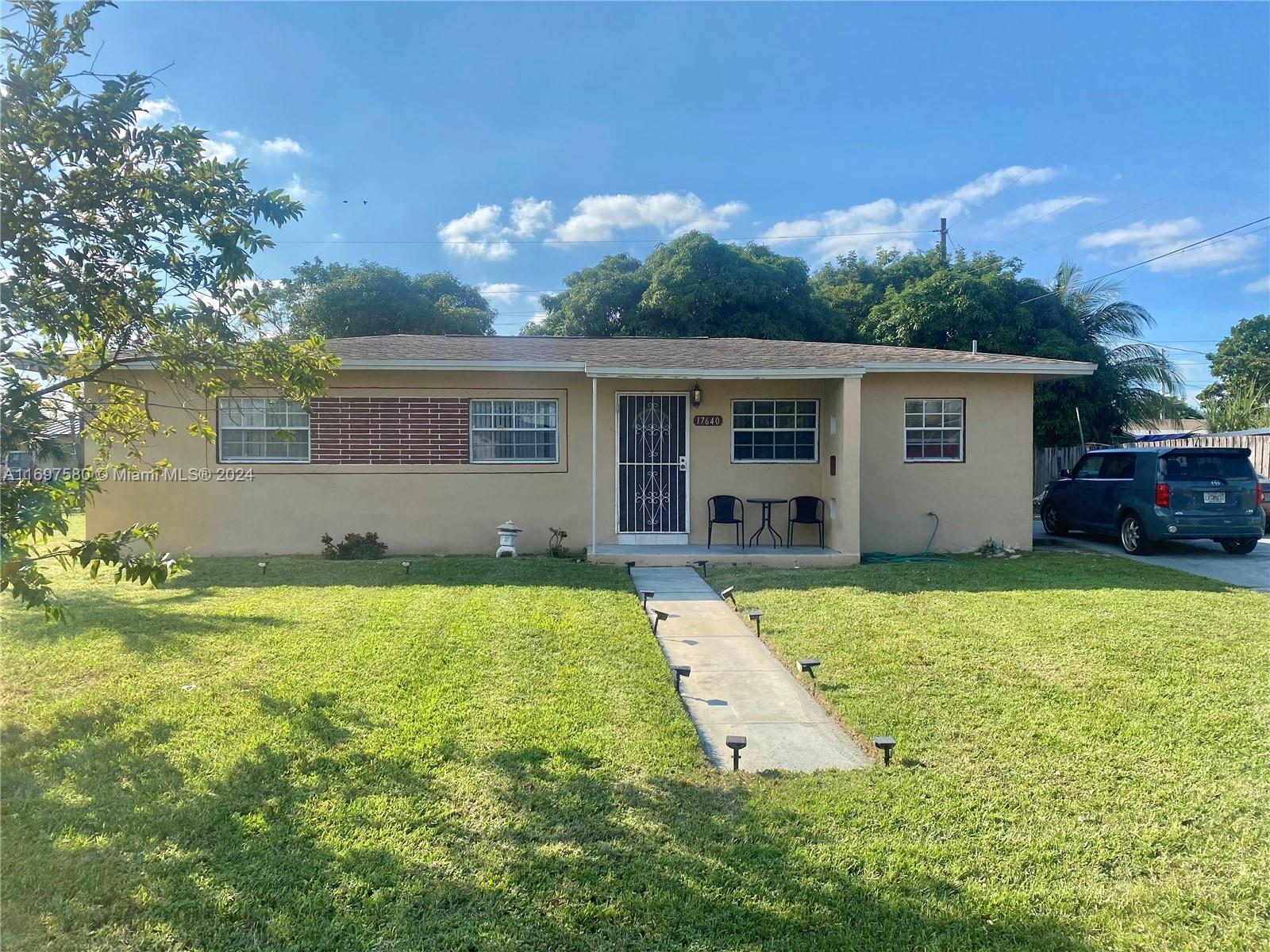 front view of house with a yard