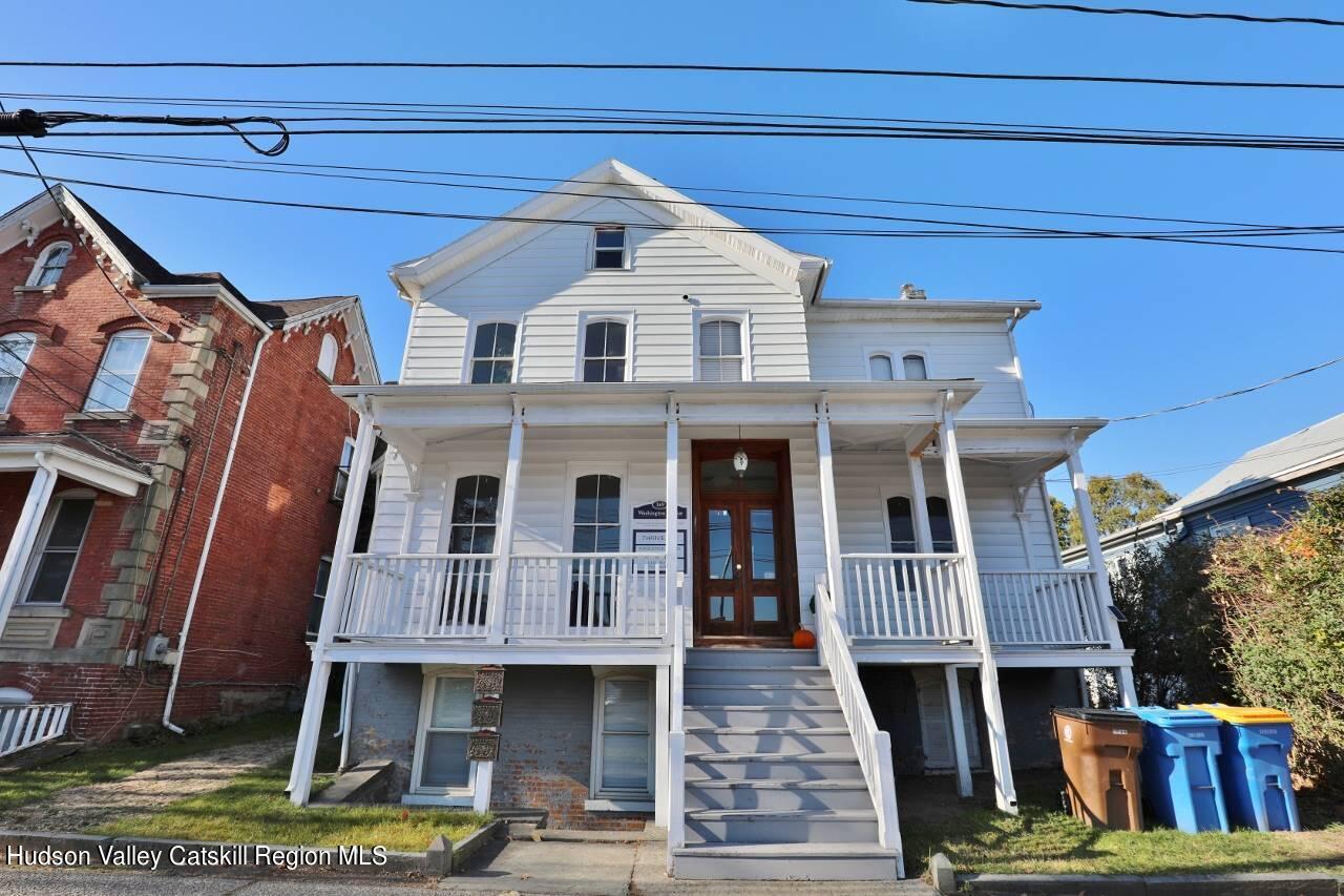 a front view of a house with a porch