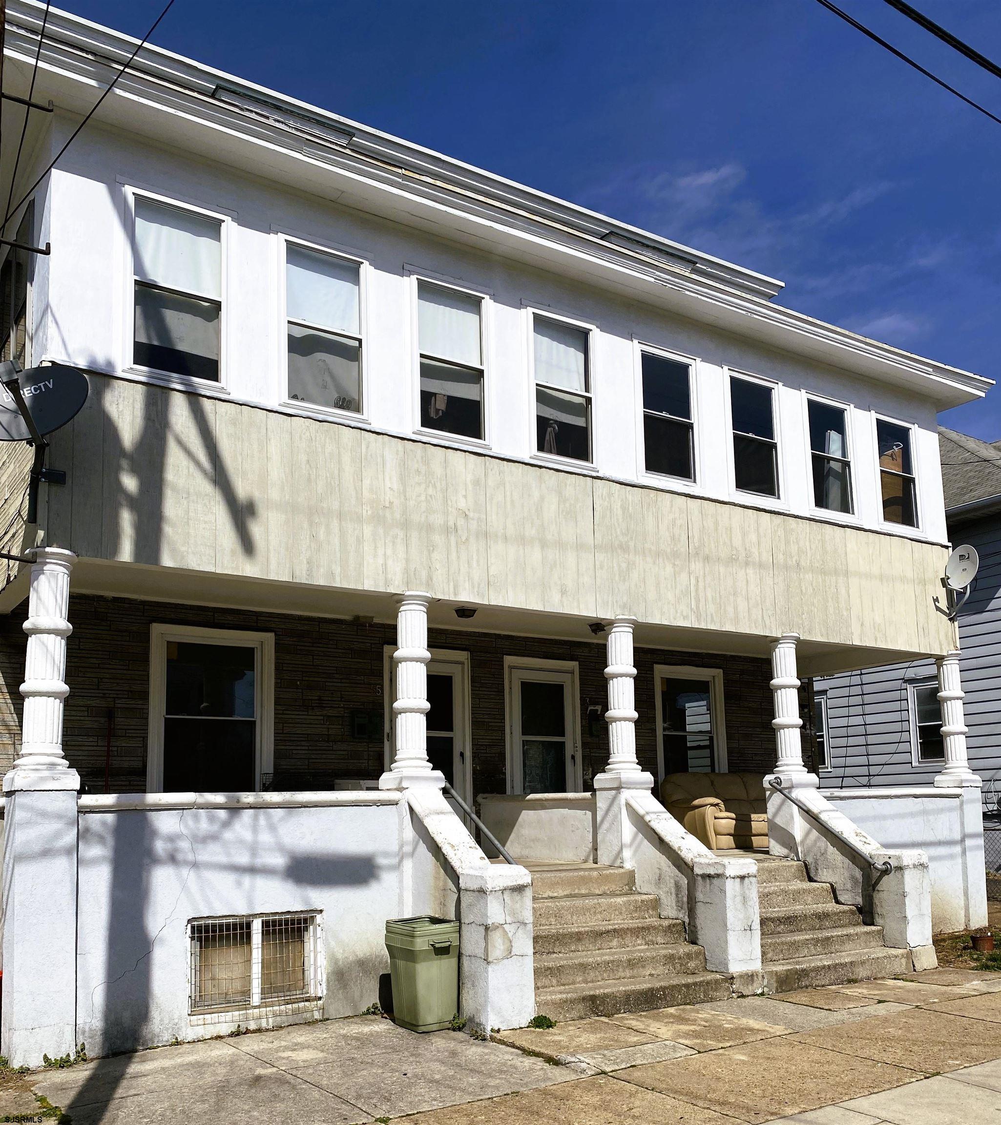 a view of a building with large windows