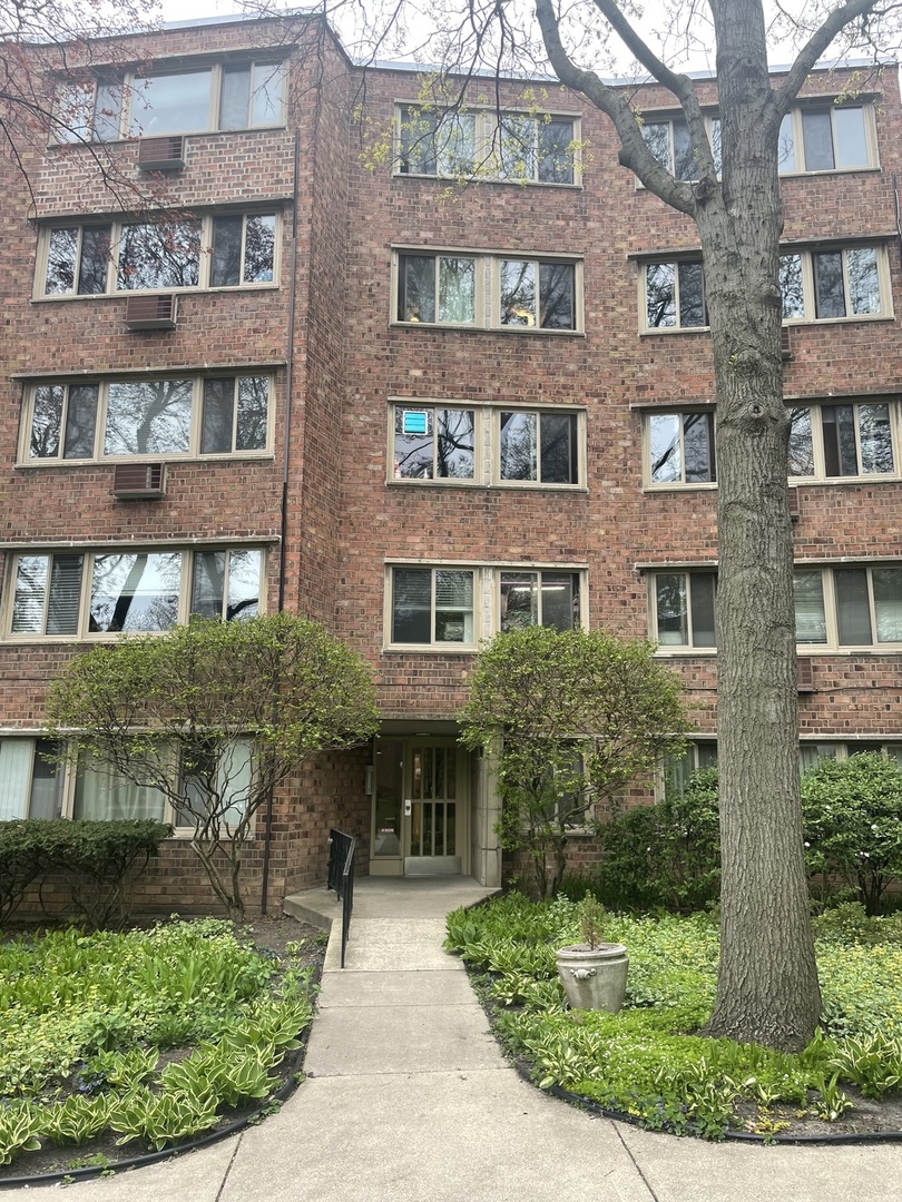 a front view of a multi story residential apartment building