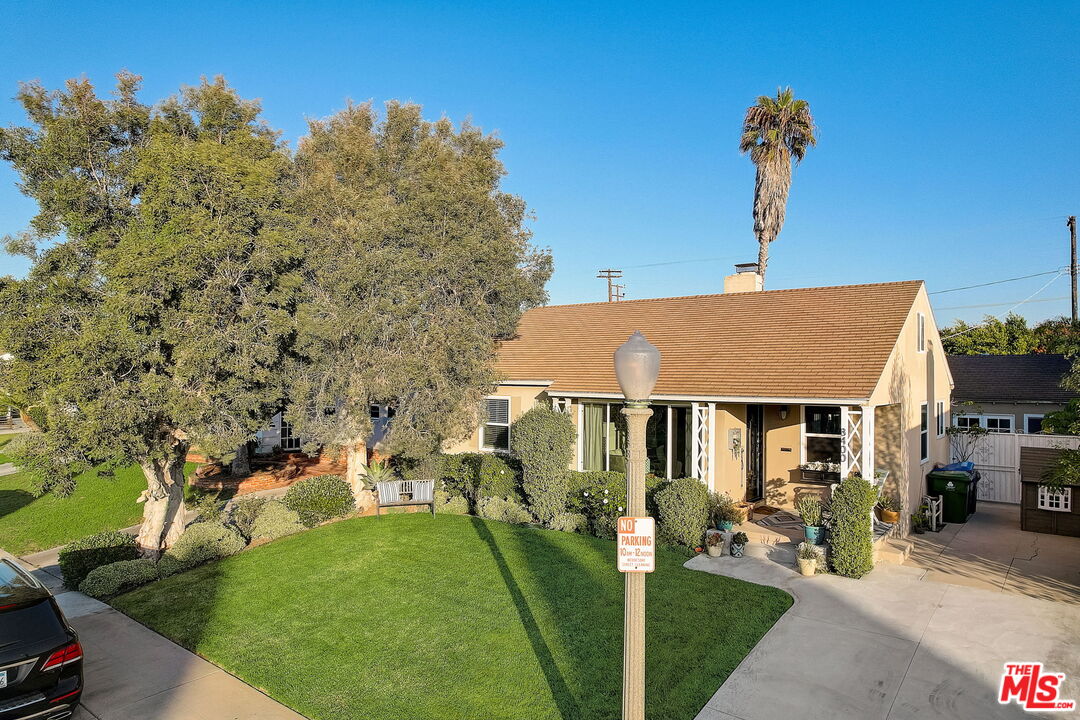 a aerial view of a house with a yard