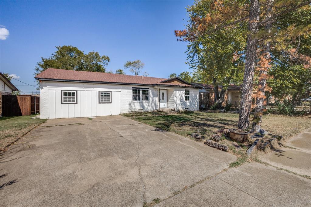 a house with trees in the background