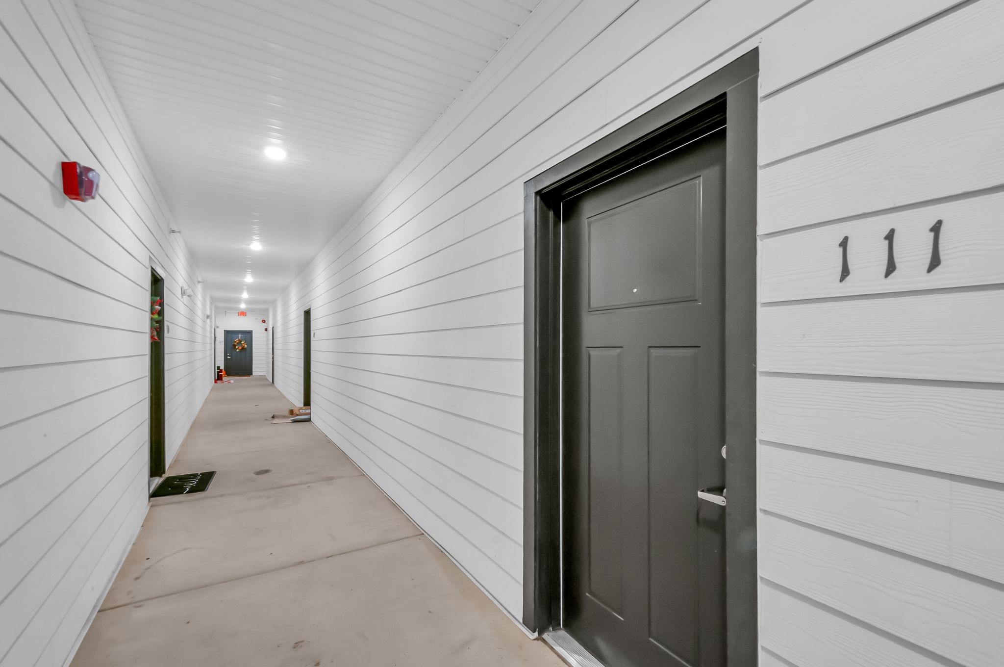 a view of a door and wooden door