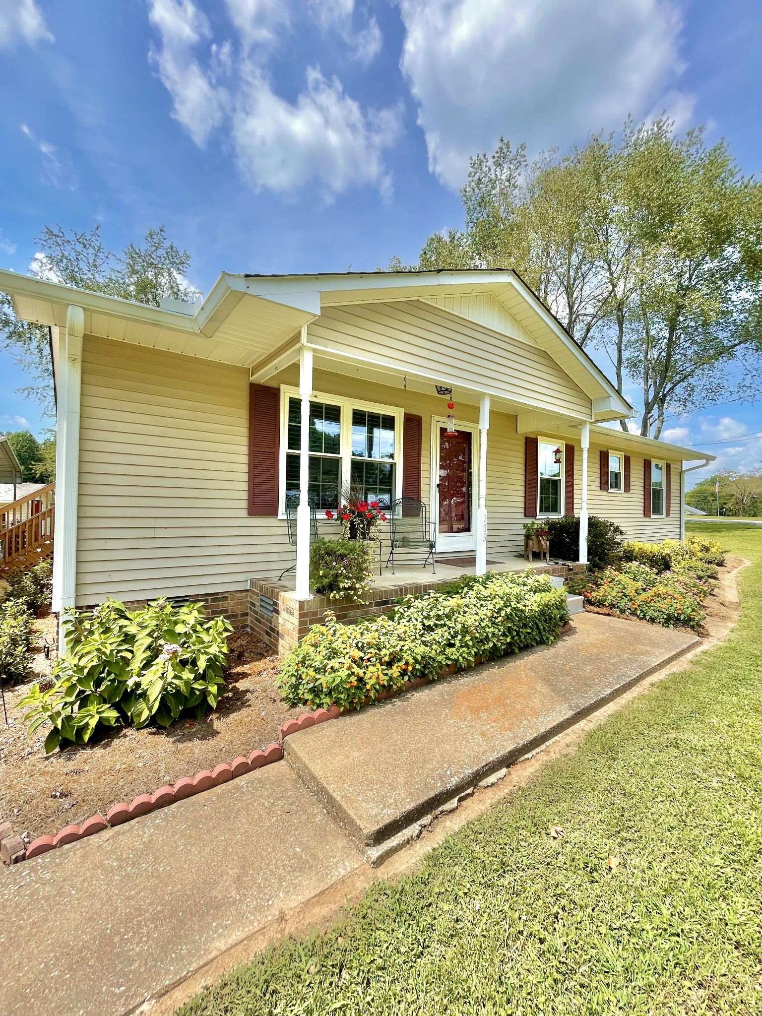 front view of a house with a yard