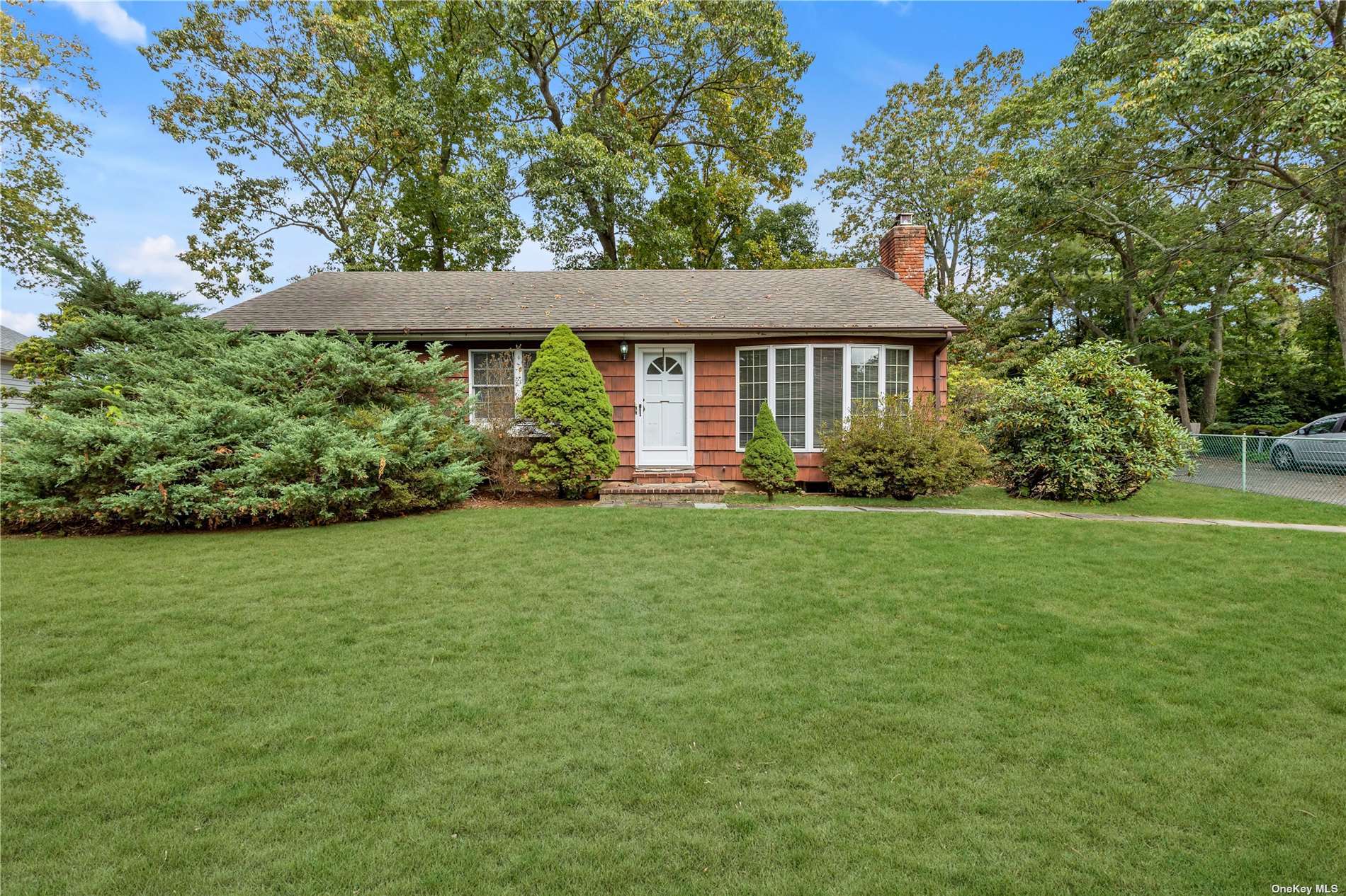 a view of a house with a garden