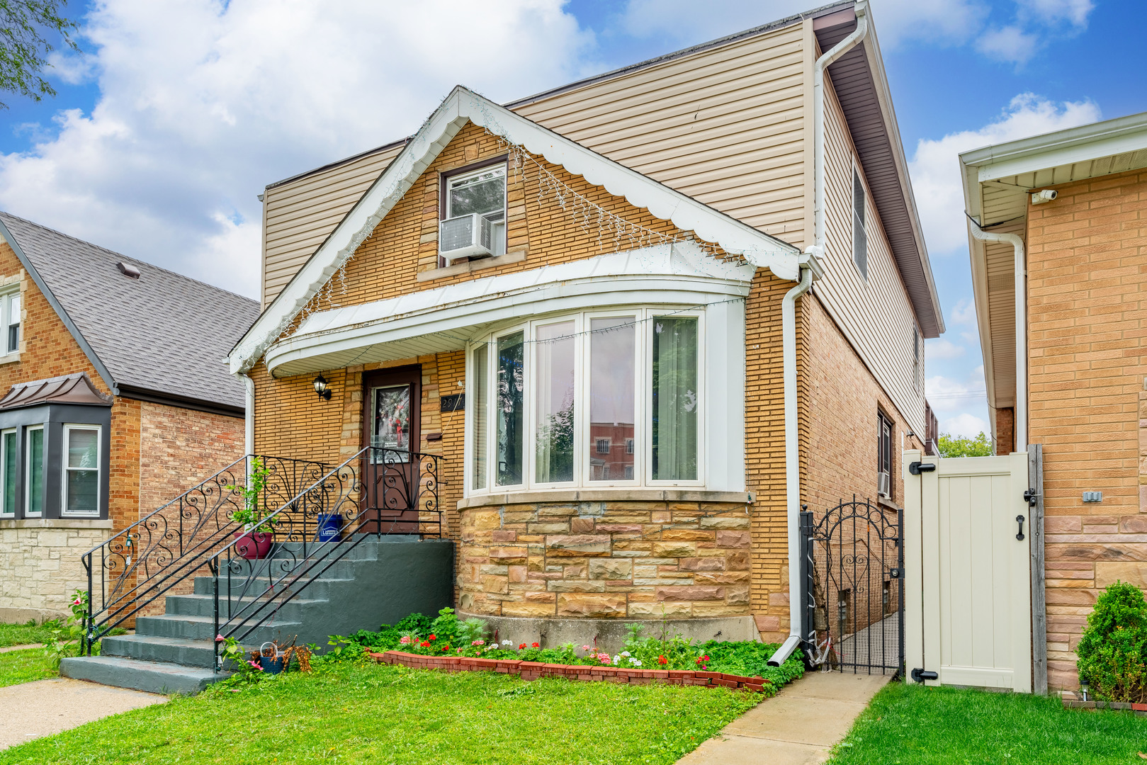 front view of a house with a yard