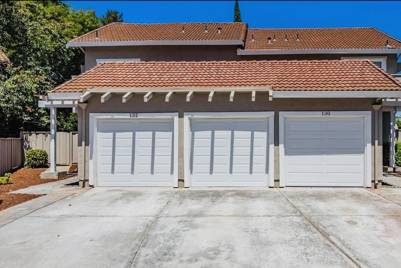 a front view of a house with a outdoor space