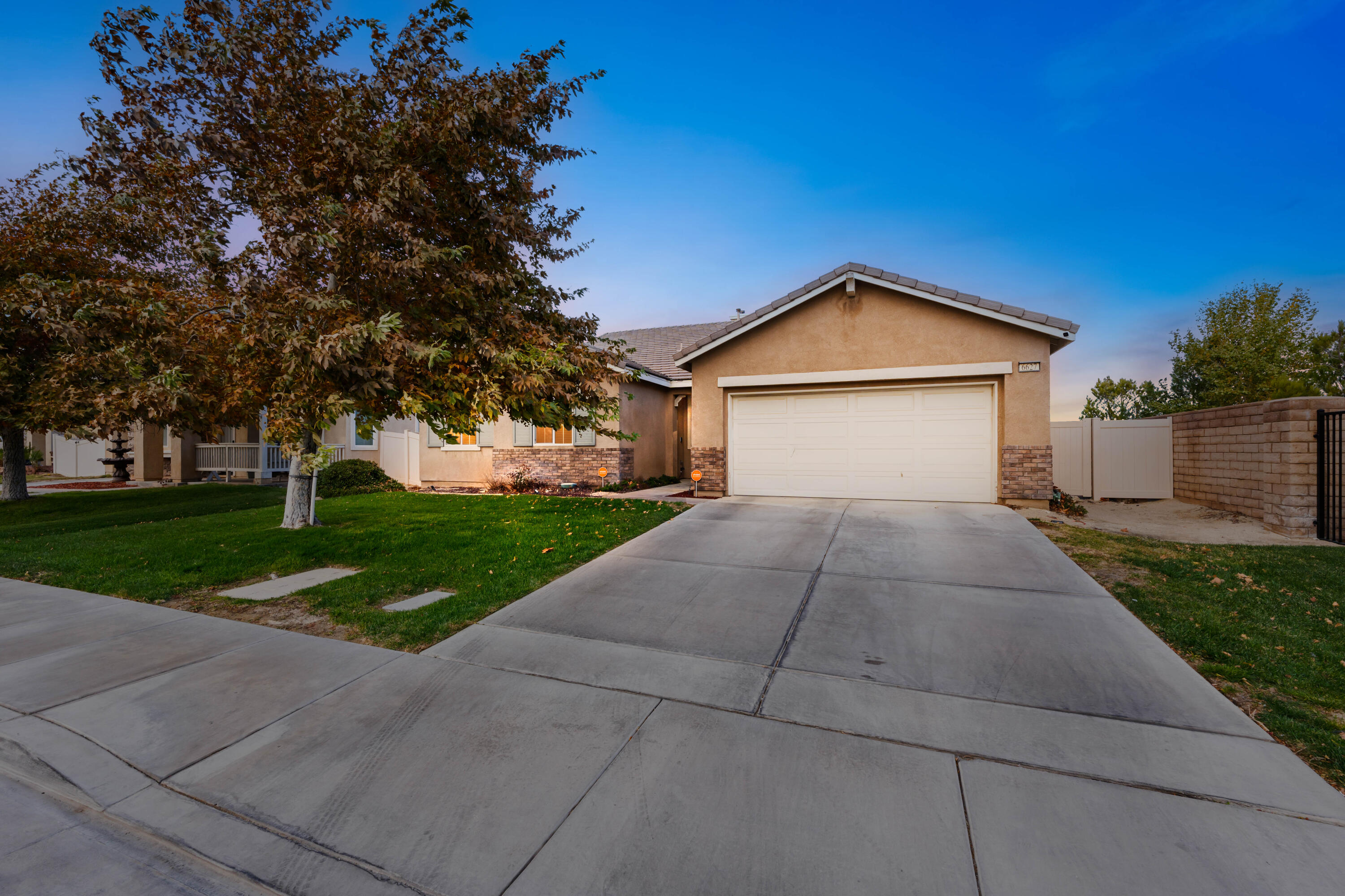 a front view of a house with yard