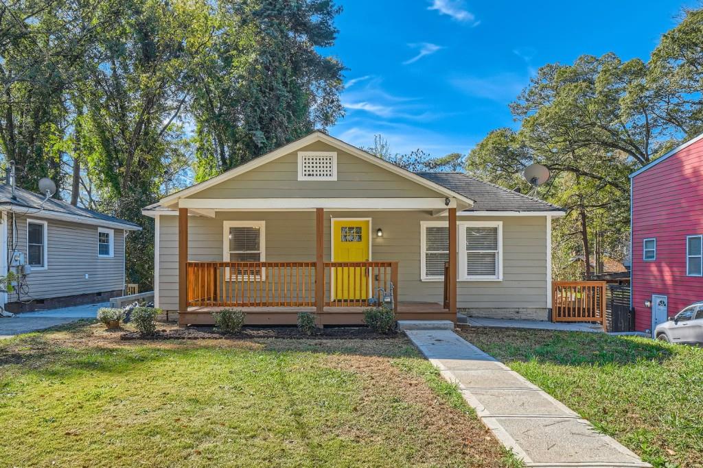 front view of a house with a yard