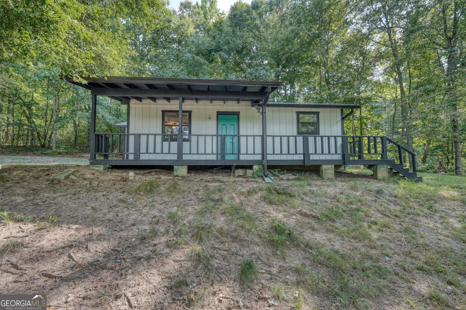 front view of a house with a yard