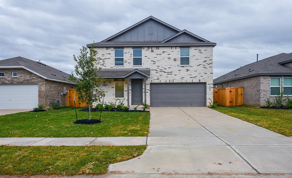 Welcome to this charming brick home with an inviting front entrance. The well-maintained facade features brickwork complemented by a covered porch. The front yard is immaculately manicured, creating a welcoming curb appeal.