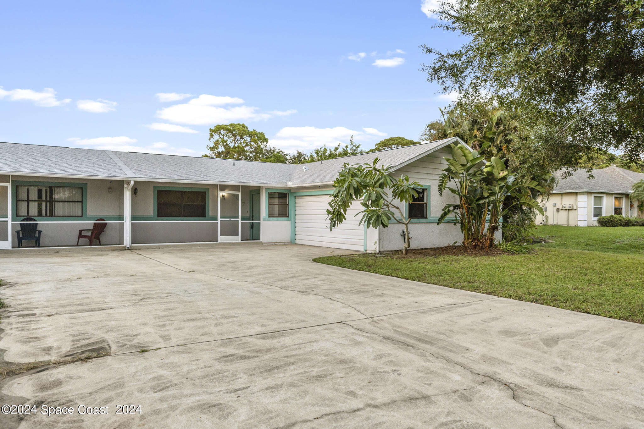 a view of house with outdoor space and street view