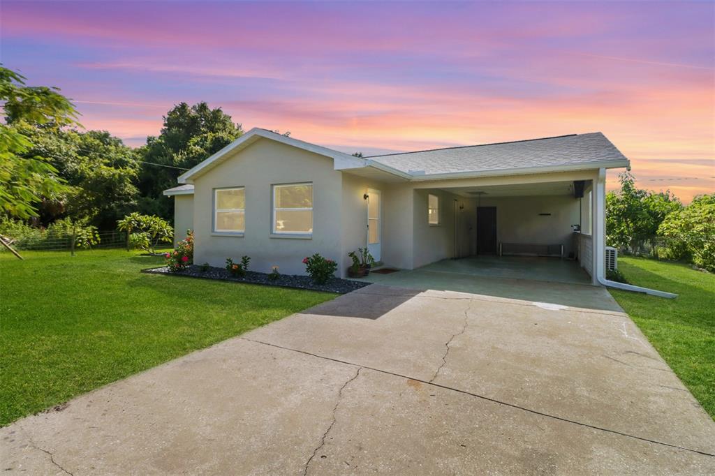 front view of a house with a yard