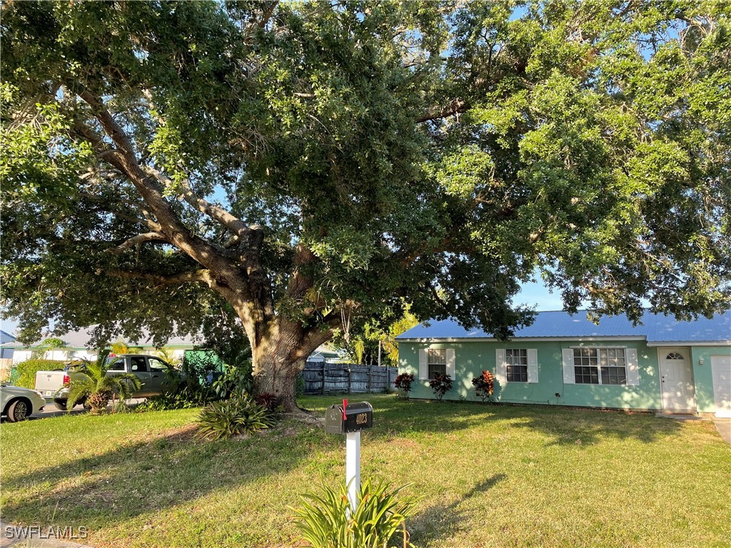 a front view of a house with swimming pool