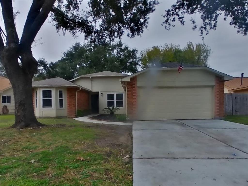 a house that has tree in front of it