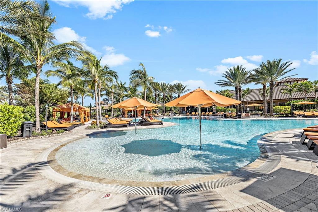 a view of a swimming pool with a patio