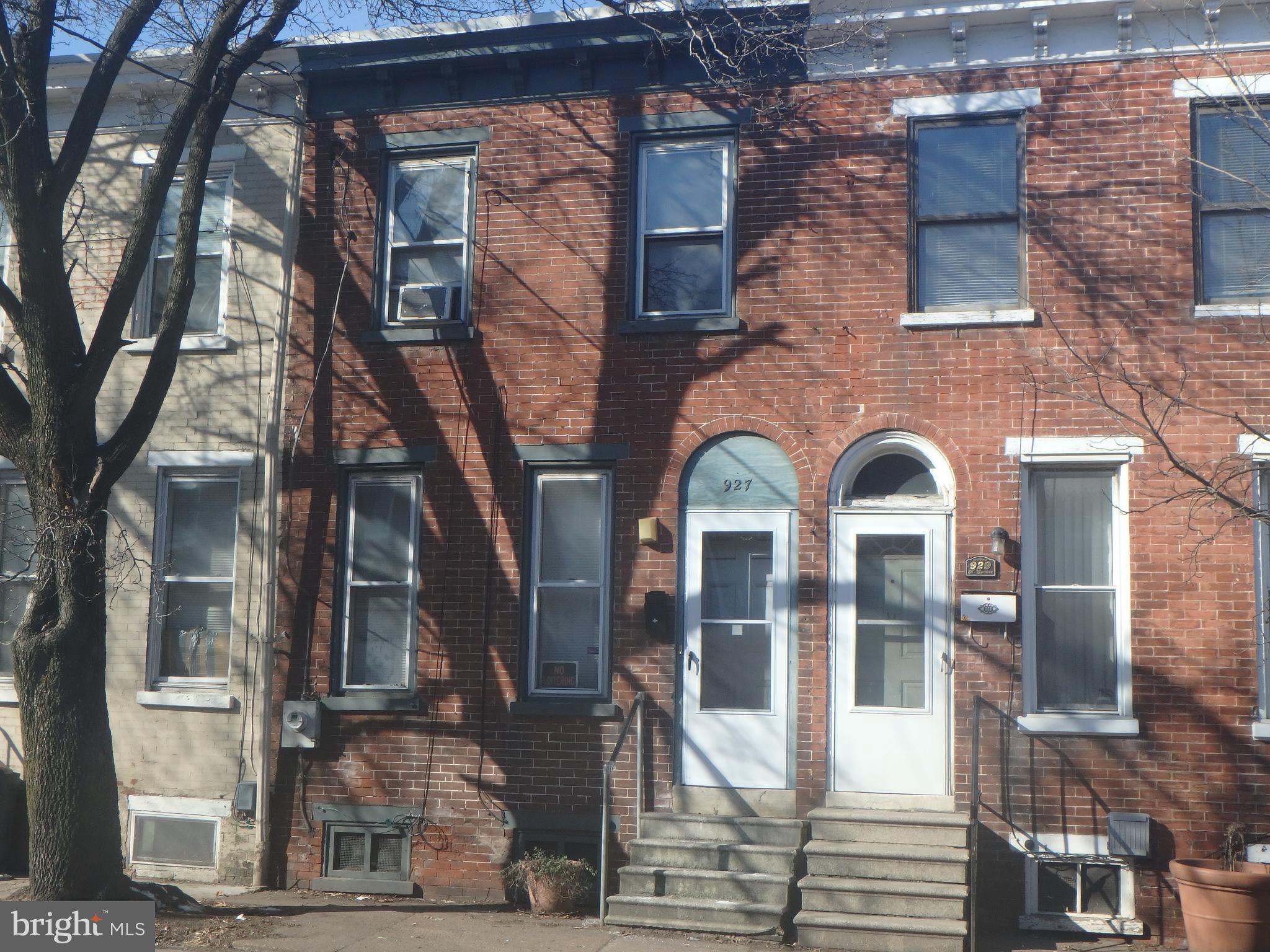 a front view of a multi story residential apartment building