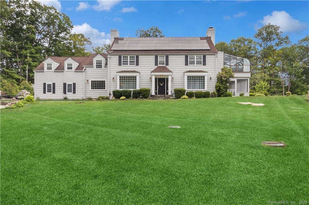 a view of a house with a big yard