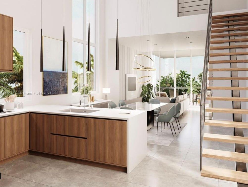 a spacious bathroom with a double vanity sink and a large mirror