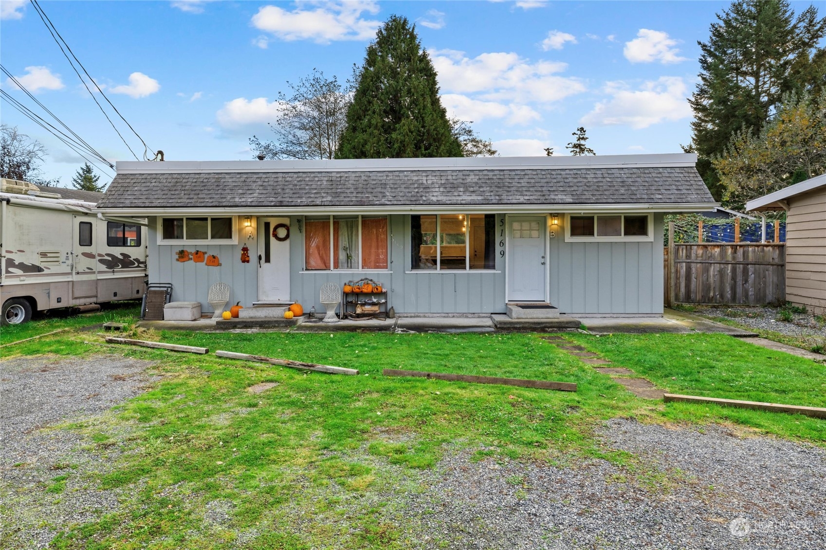 front view of a house with a yard