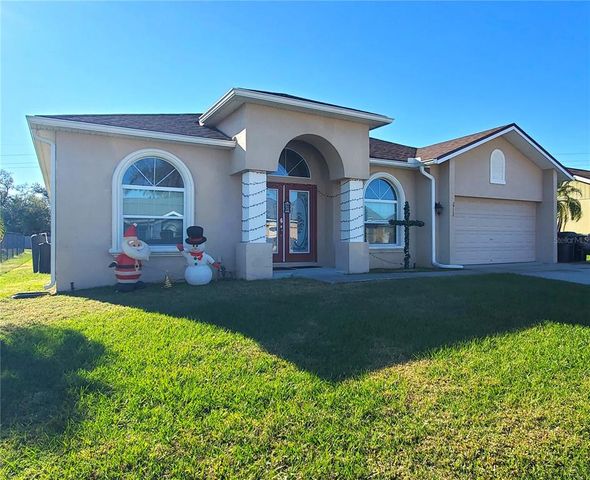 $395,000 | 2712 Oak Hammock Loop | Imperial Lakes