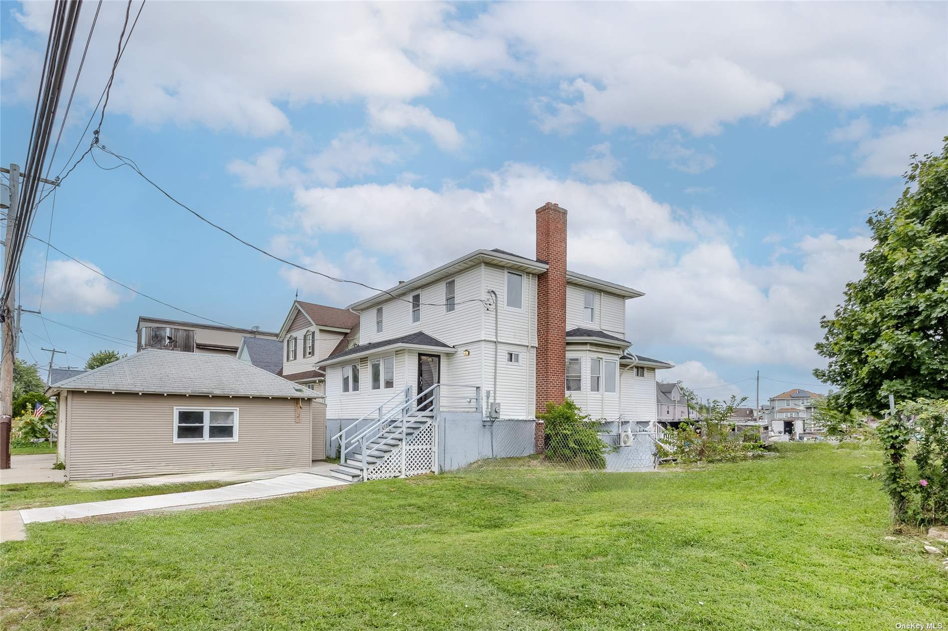 a big house with a big yard and more windows