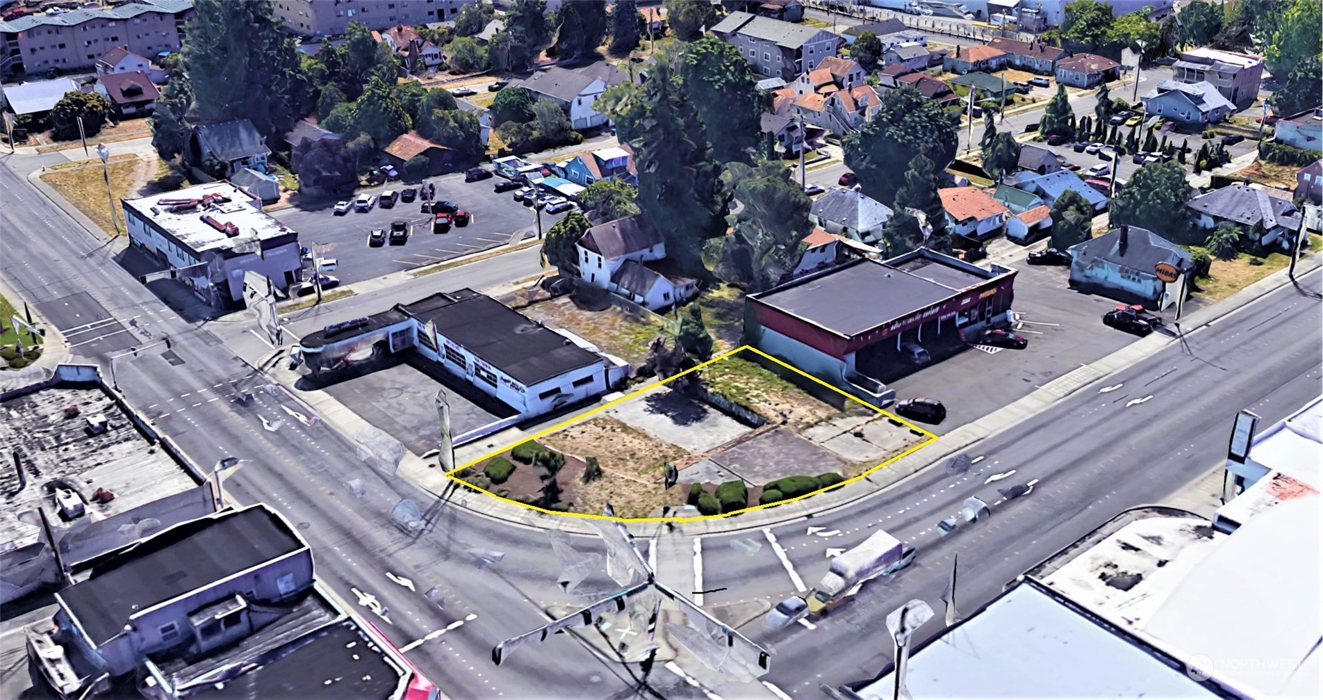 an aerial view of a house with a swimming pool