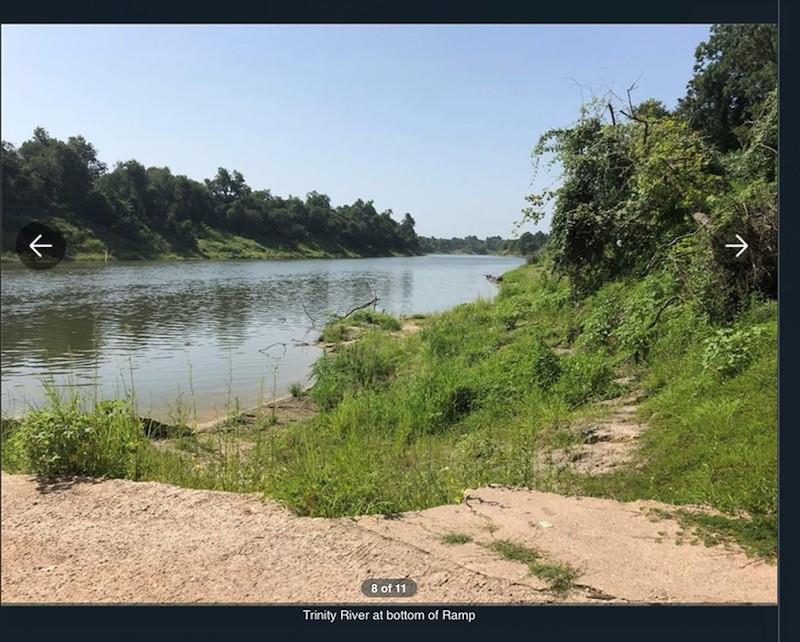 a view of a lake from a yard