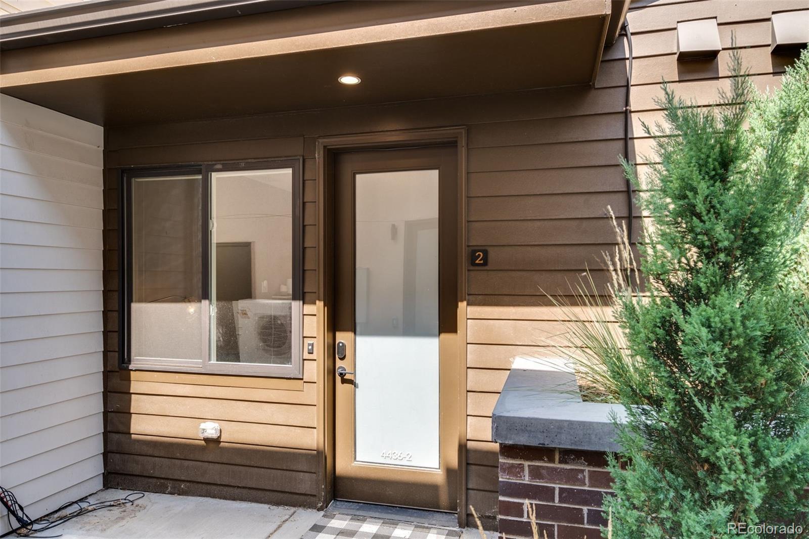 a porch with seating space and yard